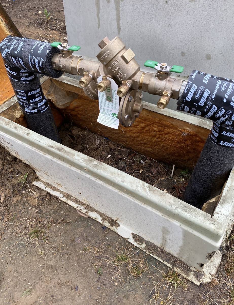 Reduced pressure zone backflow assembly installed and insulated by On Point Plumbing in Moore County NC